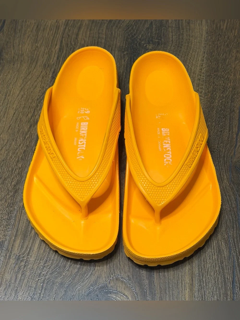 Birkenstock EVA Flip Flops in Bright Orange women’s 39